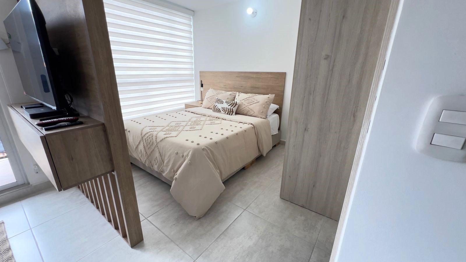hermoso apartaestudio amoblado en av 19 norte alquiler por noches (40).jpg